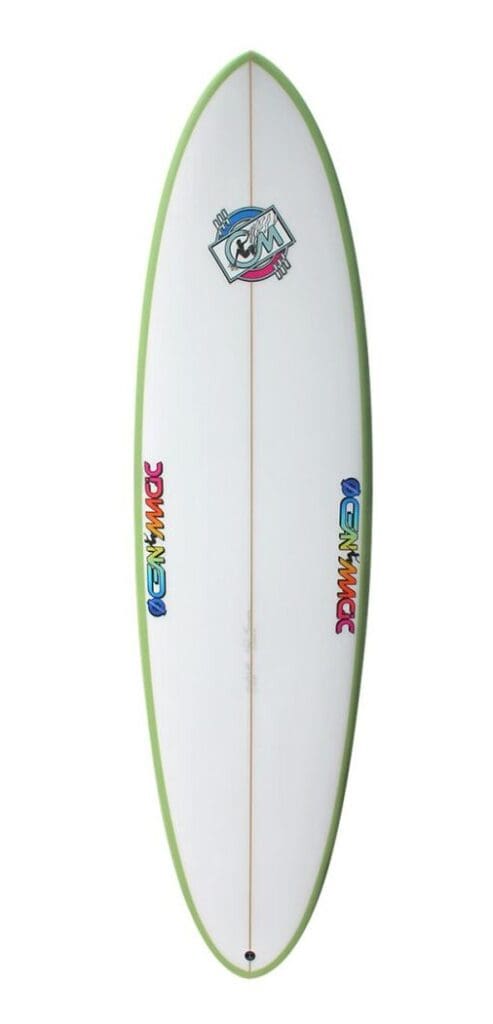 mid length surfboard in white with green rails