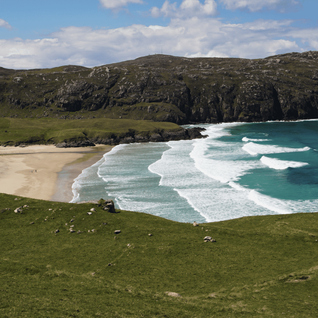 area view of the waves breaking at isle of lewis bay in Scotland